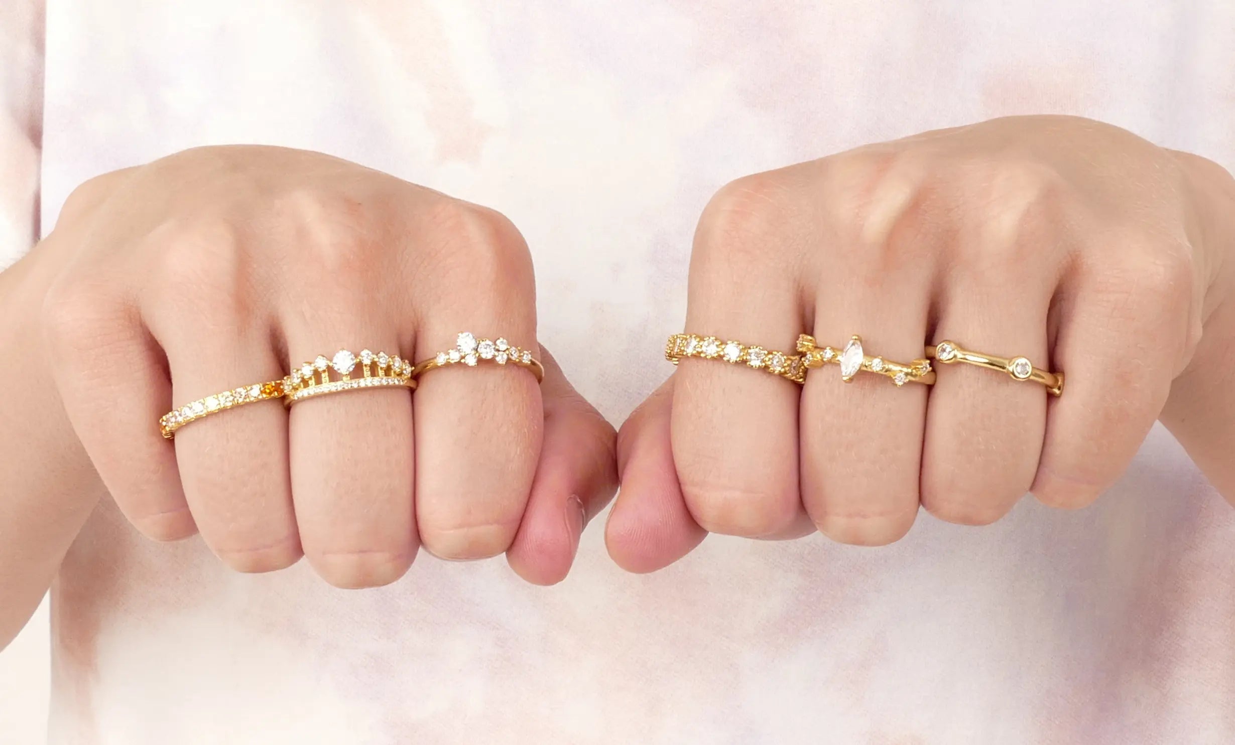 Women wearing gold silver diamond rings