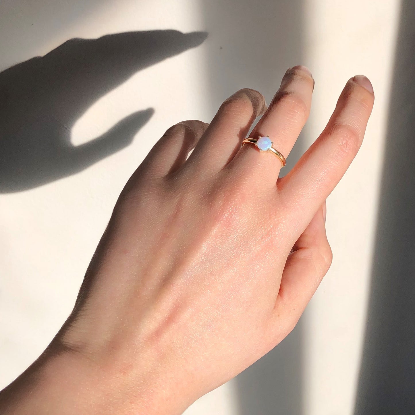Round Blue Opal Ring Crafted in Sterling Silver