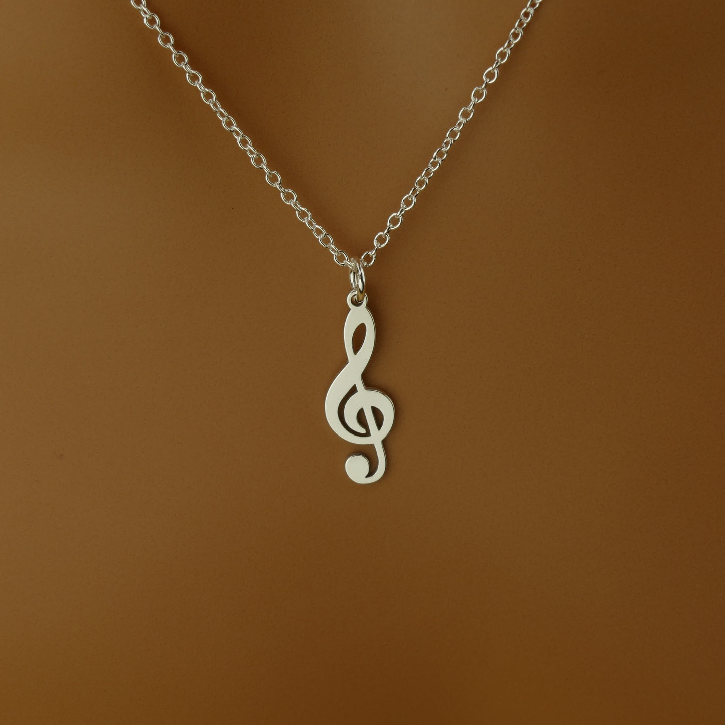 Handmade Treble Clef Music Note Necklace in Sterling Silver by Apsley & Heron