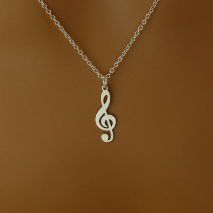 Handmade Treble Clef Music Note Necklace in Sterling Silver by Apsley & Heron