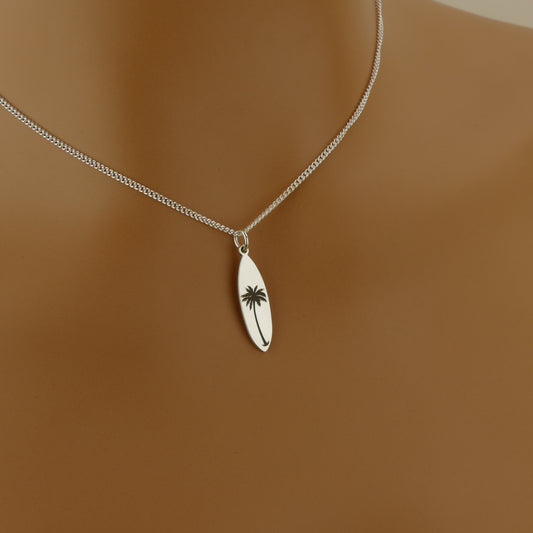 Sterling Silver Surfboard Necklace with Palm Tree Engraving by Apsley and Heron